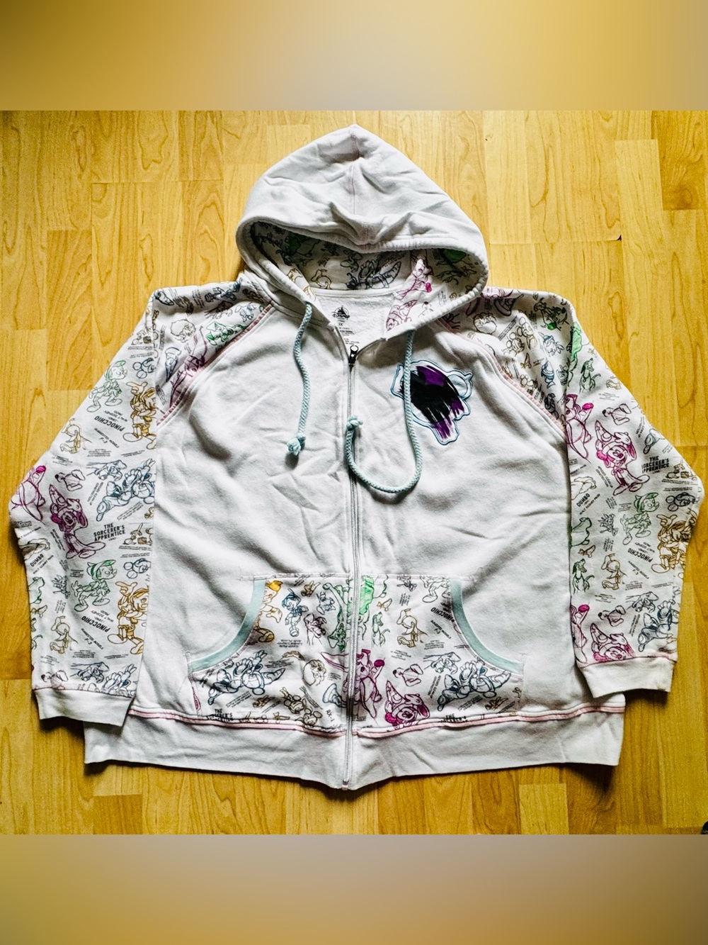 White Walt Disney World Graphic Zip-Up Hoodie with Multicolor Print.
